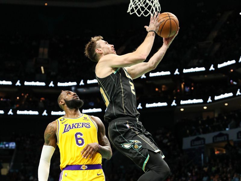 CHARLOTTE, NC - JANUARY 2: Gordon Hayward #20 of the Charlotte Hornets drives to the basket against the Los Angeles Lakers on January 2, 2023 at Spectrum Center in Charlotte, North Carolina. NOTE TO USER: User expressly acknowledges and agrees that, by downloading and or using this photograph, User is consenting to the terms and conditions of the Getty Images License Agreement. Mandatory Copyright Notice: Copyright 2023 NBAE (Photo by Brock Williams-Smith/NBAE via Getty Images)