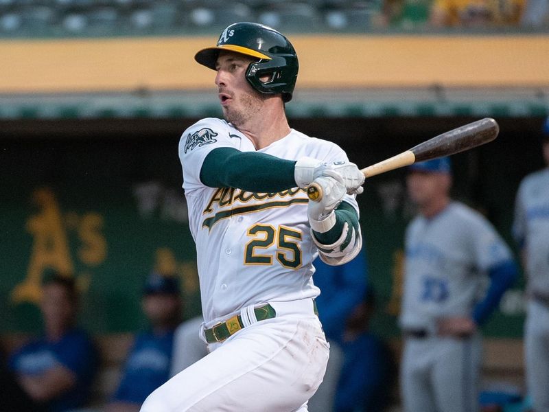 Aug 22, 2023; Oakland, California, USA; Oakland Athletics left fielder Brent Rooker (25) hits a single during the third inning against the Kansas City Royals at Oakland-Alameda County Coliseum. Mandatory Credit: Ed Szczepanski-USA TODAY Sports