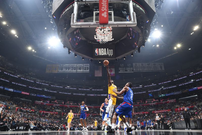 LOS ANGELES, CA - JANUARY 23:  Taurean Prince #12 of the Los Angeles Lakers goes to the basket during the game on January 23, 2024 at Crypto.Com Arena in Los Angeles, California. NOTE TO USER: User expressly acknowledges and agrees that, by downloading and/or using this Photograph, user is consenting to the terms and conditions of the Getty Images License Agreement. Mandatory Copyright Notice: Copyright 2024 NBAE (Photo by Adam Pantozzi/NBAE via Getty Images)