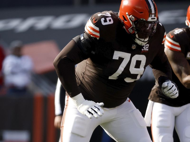 Cleveland Browns offensive tackle Dawand Jones (79) looks to make a block during an NFL football game against the Arizona Cardinals, Sunday, Nov. 5, 2023, in Cleveland. (AP Photo/Kirk Irwin)