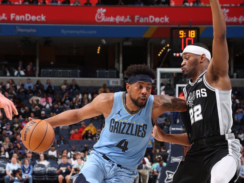 MEMPHIS, TN - APRIL 9: Jordan Goodwin #4 of the Memphis Grizzlies drives to the basket during the game against the San Antonio Spurs on April 9, 2024 at FedExForum in Memphis, Tennessee. NOTE TO USER: User expressly acknowledges and agrees that, by downloading and or using this photograph, User is consenting to the terms and conditions of the Getty Images License Agreement. Mandatory Copyright Notice: Copyright 2024 NBAE (Photo by Joe Murphy/NBAE via Getty Images)