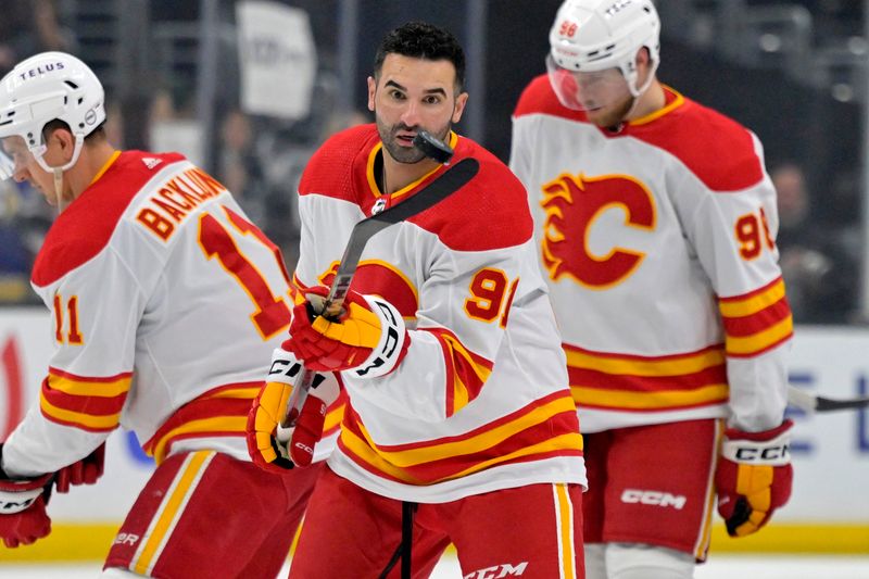 Apr 11, 2024; Los Angeles, California, USA;  Calgary Flames center Nazem Kadri (91) warms up prior to the game against the Los Angeles Kings at Crypto.com Arena. Mandatory Credit: Jayne Kamin-Oncea-USA TODAY Sports