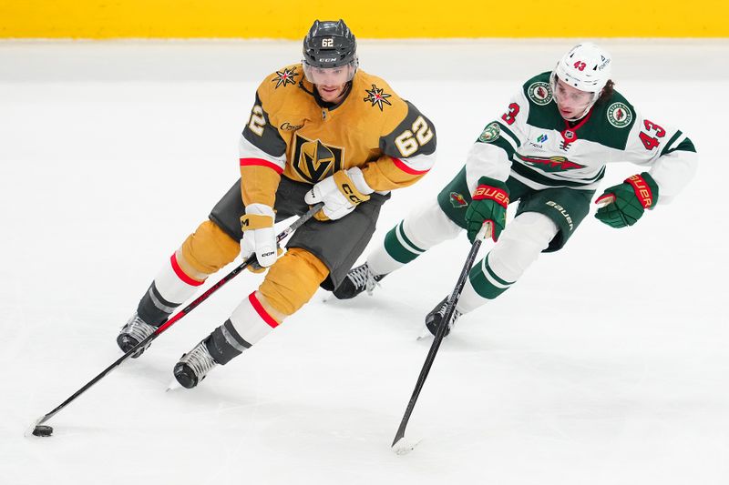 Mar 6, 2026; Las Vegas, Nevada, USA; Vegas Golden Knights center Nic Dowd (62) skates against Minnesota Wild defenseman Quinn Hughes (43) during the third period at T-Mobile Arena. Mandatory Credit: Stephen R. Sylvanie-Imagn Images