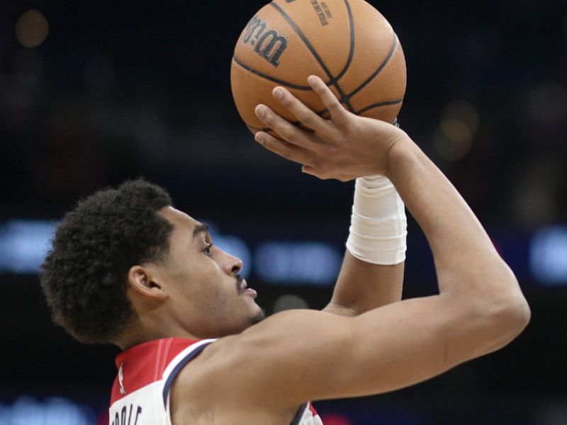 WASHINGTON, DC - JANUARY 24: Jordan Poole #13 of the Washington Wizards shoots against the Minnesota Timberwolves during the second half at Capital One Arena on January 24, 2024 in Washington, DC. NOTE TO USER: User expressly acknowledges and agrees that, by downloading and or using this photograph, User is consenting to the terms and conditions of the Getty Images License Agreement. (Photo by Jess Rapfogel/Getty Images)