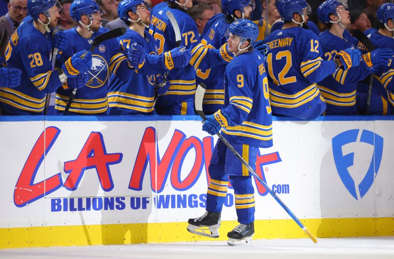 Apr 11, 2024; Buffalo, New York, USA;  Buffalo Sabres left wing Zach Benson (9) celebrates his goal with teammates during the first period against the Washington Capitals at KeyBank Center. Mandatory Credit: Timothy T. Ludwig-USA TODAY Sports