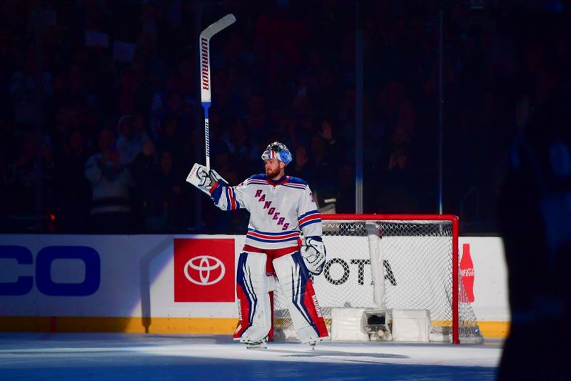 Jan 20, 2024; Los Angeles, California, USA; New York Rangers goaltender Jonathan Quick (32) ackowledges spectators after the Los Angeles Kings play a video tribute for him durng the first period at Crypto.com Arena. Mandatory Credit: Gary A. Vasquez-USA TODAY Sports