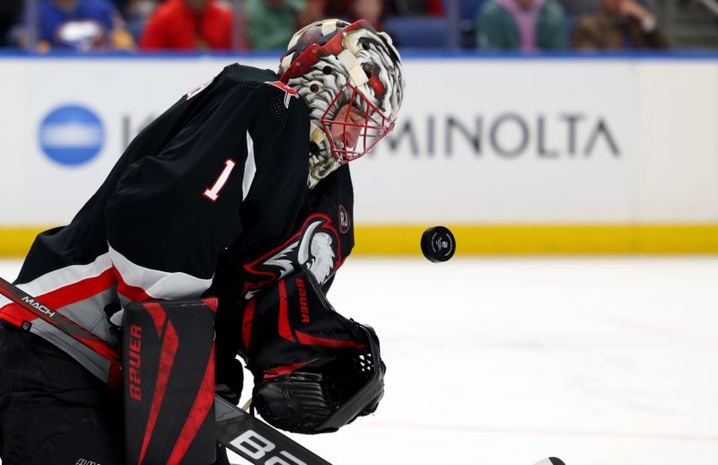 Jan 11, 2024; Buffalo, New York, USA;  Buffalo Sabres goaltender Ukko-Pekka Luukkonen (1) makes a save during the second period against the Ottawa Senators at KeyBank Center. Mandatory Credit: Timothy T. Ludwig-USA TODAY Sports