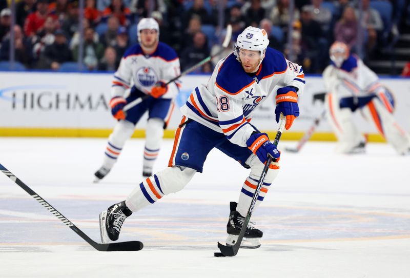 Mar 10, 2025; Buffalo, New York, USA;  Edmonton Oilers right wing Connor Brown (28) looks to make a pass during the third period against the Buffalo Sabres at KeyBank Center. Mandatory Credit: Timothy T. Ludwig-Imagn Images
