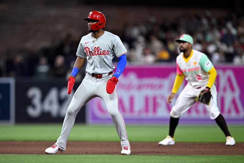 Apr 26, 2024; San Diego, California, USA; Philadelphia Phillies center fielder Johan Rojas (18) leads off second base during the eighth inning against the San Diego Padres at Petco Park. Mandatory Credit: Orlando Ramirez-USA TODAY Sports