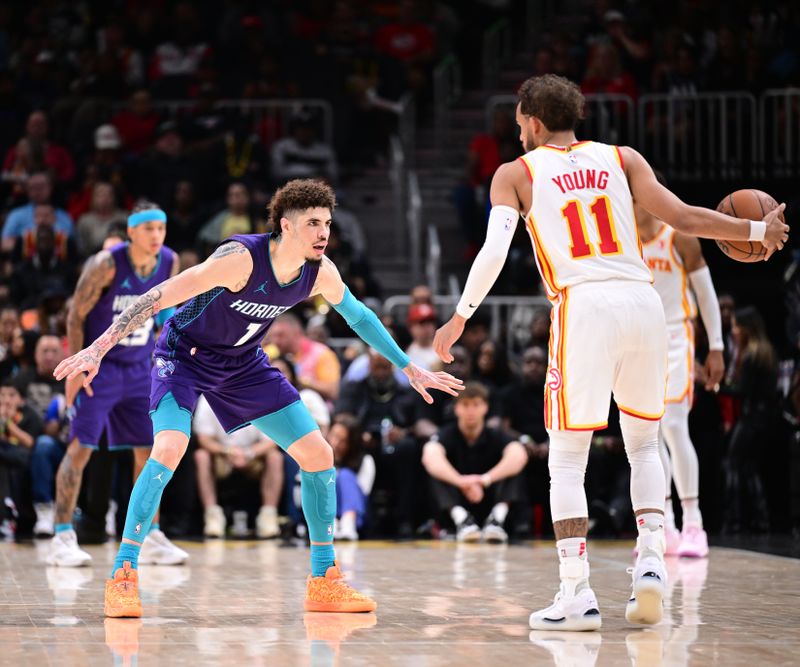 ATLANTA, GA - OCTOBER 25: LaMelo Ball #1 of the Charlotte Hornets plays defense during the game against the Atlanta Hawks on October 25, 2024 at State Farm Arena in Atlanta, Georgia.  NOTE TO USER: User expressly acknowledges and agrees that, by downloading and/or using this Photograph, user is consenting to the terms and conditions of the Getty Images License Agreement. Mandatory Copyright Notice: Copyright 2024 NBAE (Photo by Adam Hagy/NBAE via Getty Images)