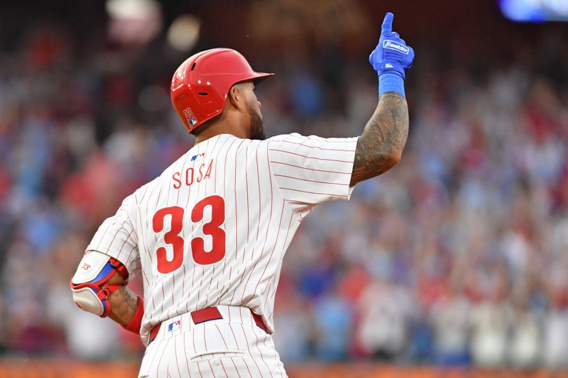 May 22, 2024; Philadelphia, Pennsylvania, USA; Philadelphia Phillies shortstop Edmundo Sosa (33) celebrates his three run home run against the Texas Rangers during the fourth inning at Citizens Bank Park. Mandatory Credit: Eric Hartline-USA TODAY Sports