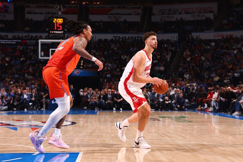 OKLAHOMA CITY, OK - FEBRUARY 27: Alperen Sengun #28 of the Houston Rockets looks to pass the ball during the game against the Oklahoma City Thunder on February, 2024 at Paycom Arena in Oklahoma City, Oklahoma. NOTE TO USER: User expressly acknowledges and agrees that, by downloading and or using this photograph, User is consenting to the terms and conditions of the Getty Images License Agreement. Mandatory Copyright Notice: Copyright 2024 NBAE (Photo by Zach Beeker/NBAE via Getty Images)