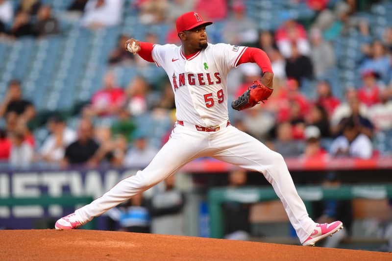 May 24, 2025; Anaheim, California, USA; Los Angeles Angels pitcher Jose Soriano (59) throws against the Miami Marlins during the first inning at Angel Stadium. Mandatory Credit: Gary A. Vasquez-Imagn Images