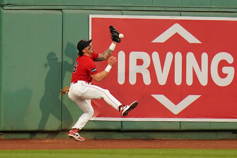 Jun 1, 2023; Boston, Massachusetts, USA; Boston Red Sox center fielder Jarren Duran (16) misses the catch against the Cincinnati Reds in the fourth inning at Fenway Park. Mandatory Credit: David Butler II-USA TODAY Sports