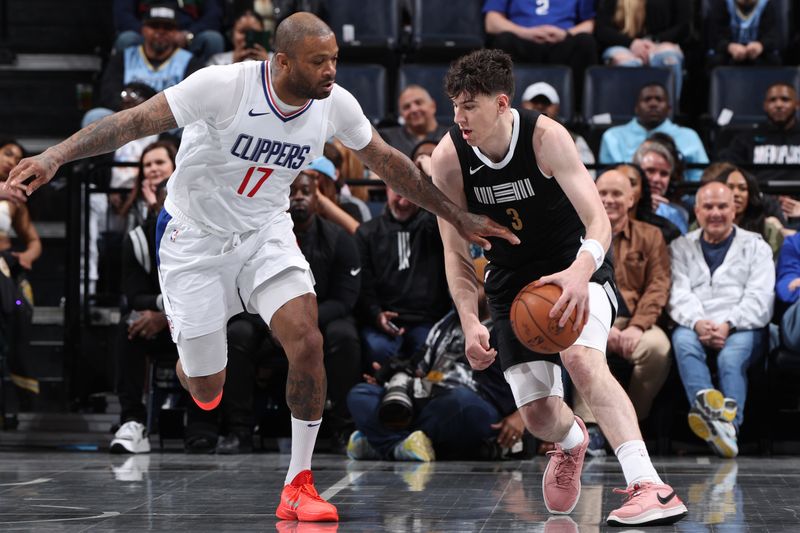 MEMPHIS, TN - FEBRUARY 23: Jake LaRavia #3 of the Memphis Grizzlies dribbles the ball during the game against the LA Clippers on February 23, 2024 at FedExForum in Memphis, Tennessee. NOTE TO USER: User expressly acknowledges and agrees that, by downloading and or using this photograph, User is consenting to the terms and conditions of the Getty Images License Agreement. Mandatory Copyright Notice: Copyright 2024 NBAE (Photo by Joe Murphy/NBAE via Getty Images)