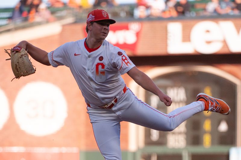 Aug 13, 2024; San Francisco, California, USA;  San Francisco Giants pitcher Kyle Harrison (45) throws a pitch against the Atlanta Braves during the first inning at Oracle Park. Mandatory Credit: Ed Szczepanski-USA TODAY Sports