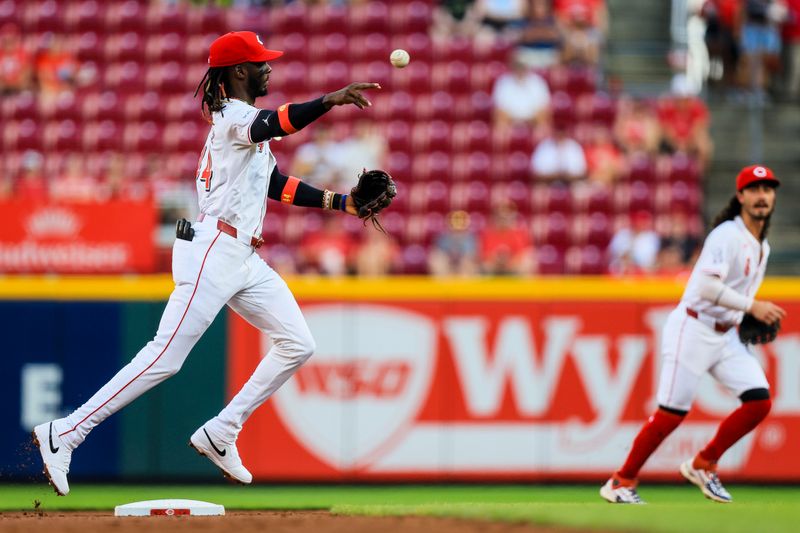 Aug 27, 2024; Cincinnati, Ohio, USA; Cincinnati Reds shortstop Elly De La Cruz (44) throws to first to get Oakland Athletics shortstop Jacob Wilson (not pictured) out in the third inning at Great American Ball Park. Mandatory Credit: Katie Stratman-USA TODAY Sports