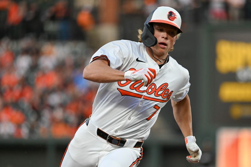 Apr 16, 2024; Baltimore, Maryland, USA;  Baltimore Orioles second baseman Jackson Holliday (7) rounds third base to score on shortstop Gunnar Henderson (not pictured) third inning single against the Minnesota Twins at Oriole Park at Camden Yards. Mandatory Credit: Tommy Gilligan-USA TODAY Sports