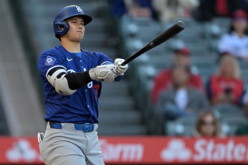 Mar 26, 2024; Anaheim, California, USA; Los Angeles Dodgers designated hitter Shohei Ohtani (17) strikes out in the first inning against the Los Angeles Angels at Angel Stadium. Mandatory Credit: Jayne Kamin-Oncea-USA TODAY Sports