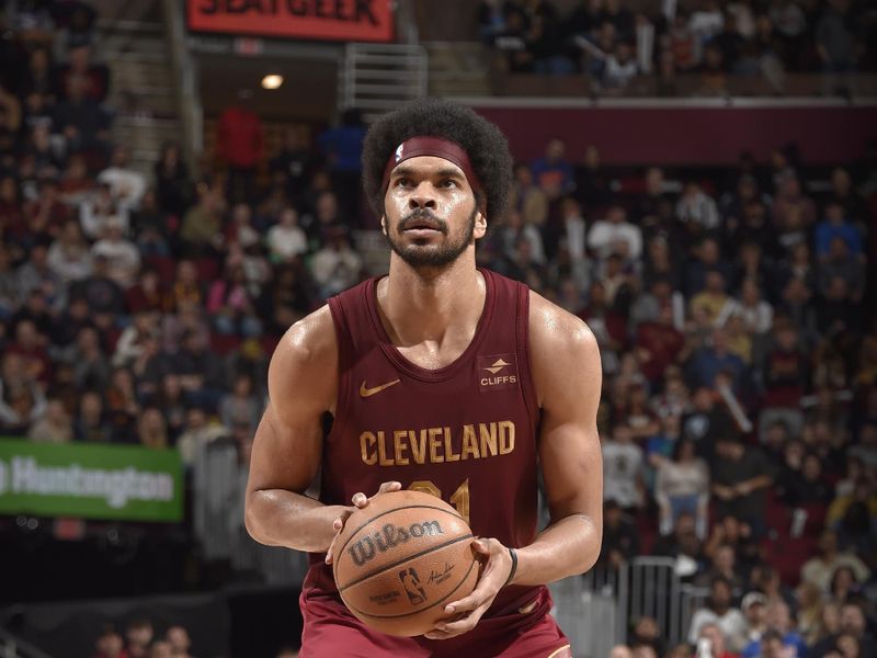 CLEVELAND, OH - MARCH 8: Jarrett Allen #31 of the Cleveland Cavaliers prepares to shoot a free throw during the game against the Minnesota Timberwolves on March 8, 2024 at Rocket Mortgage FieldHouse in Cleveland, Ohio. NOTE TO USER: User expressly acknowledges and agrees that, by downloading and/or using this Photograph, user is consenting to the terms and conditions of the Getty Images License Agreement. Mandatory Copyright Notice: Copyright 2024 NBAE (Photo by David Liam Kyle/NBAE via Getty Images)