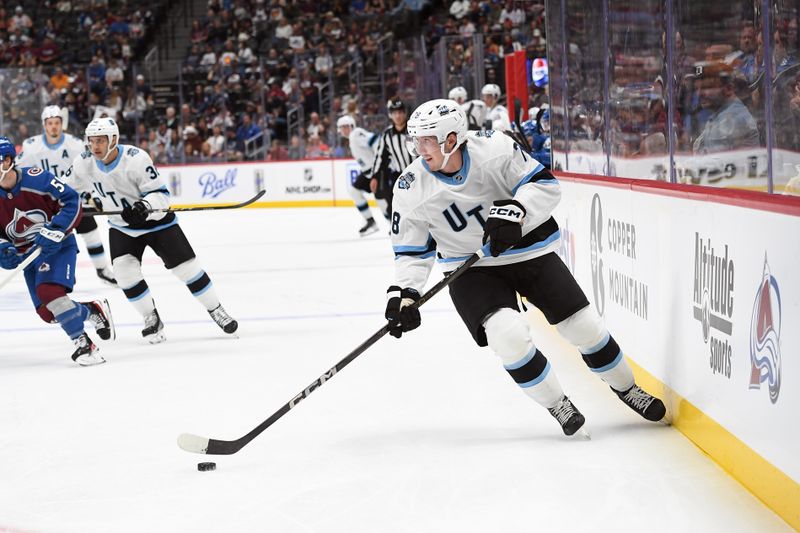 Sep 29, 2024; Denver, Colorado, USA; Utah Hockey Club forward Cameron Hebig (78) skates with the puck during the first period against the Colorado Avalanche at Ball Arena. Mandatory Credit: Christopher Hanewinckel-Imagn Images