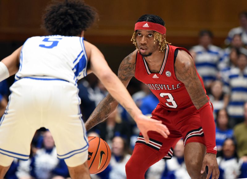 Feb 20, 2023; Durham, North Carolina, USA;Louisville Cardinals guard El Ellis (3) controls the ball against Duke Blue Devils guard Tyrese Proctor(5)  during the first half at Cameron Indoor Stadium. Mandatory Credit: Rob Kinnan-USA TODAY Sports