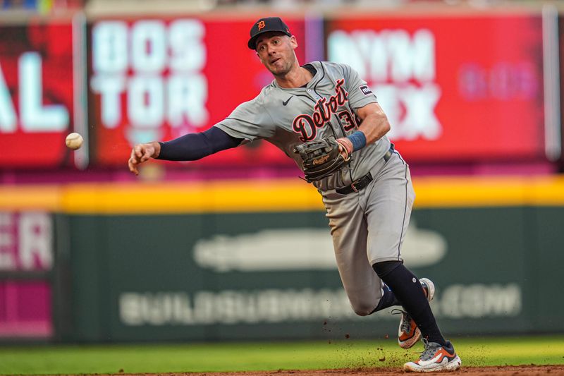 Jun 17, 2024; Cumberland, Georgia, USA; Detroit Tigers shortstop Ryan Kreidler (32) recovers to throw out Atlanta Braves shortstop Orlando Arcia (11) (not shown) during the third inning at Truist Park. Mandatory Credit: Dale Zanine-USA TODAY Sports