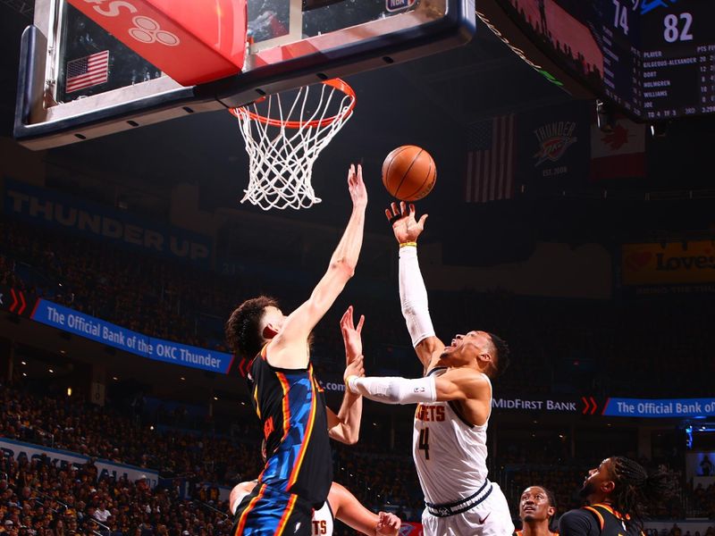 OKLAHOMA CITY, OK - MAY 5:  Russell Westbrook #4 of the Denver Nuggets drives to the basket during the game against the Oklahoma City Thunder during Round Two Game One of the 2025 NBA Playoffs on MAY 5, 2025 at Paycom Center in Oklahoma City, Oklahoma. NOTE TO USER: User expressly acknowledges and agrees that, by downloading and or using this photograph, User is consenting to the terms and conditions of the Getty Images License Agreement. Mandatory Copyright Notice: Copyright 2025 NBAE (Photo by Zach Beeker/NBAE via Getty Images)