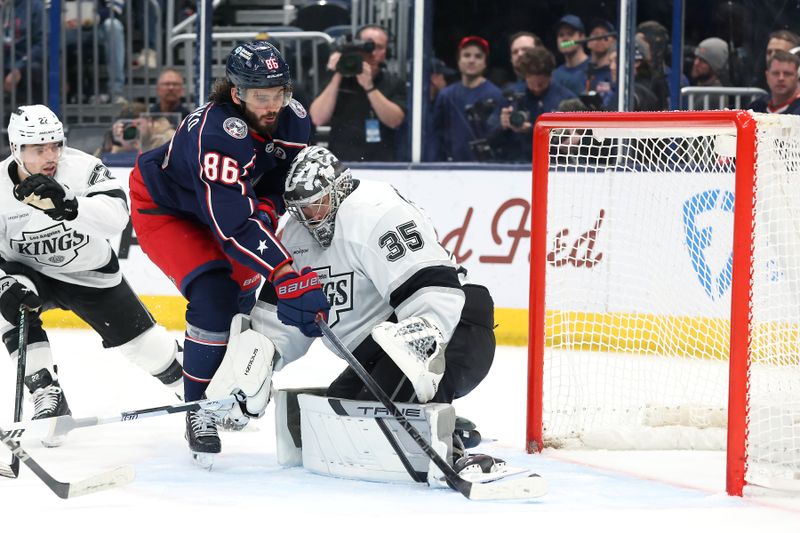 Jan 25, 2025; Columbus, Ohio, USA;  Columbus Blue Jackets right wing Kirill Marchenko (86) scores the game winning goal on Los Angeles Kings goaltender Darcy Kuemper (35) in overtime at Nationwide Arena. Mandatory Credit: Joseph Maiorana-Imagn Images