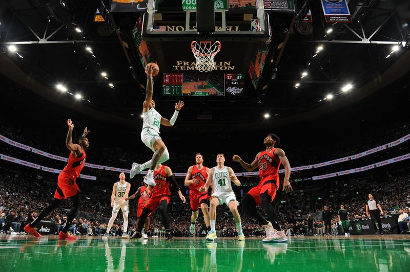 BOSTON, MA - OCTOBER 13: JD Davison #20 of the Boston Celtics shoots the ball during the game against the Toronto Raptors during a NBA pre season game on October 13, 2024 at TD Garden in Boston, Massachusetts. NOTE TO USER: User expressly acknowledges and agrees that, by downloading and/or using this Photograph, user is consenting to the terms and conditions of the Getty Images License Agreement. Mandatory Copyright Notice: Copyright 2024 NBAE (Photo by Brian Babineau/NBAE via Getty Images)