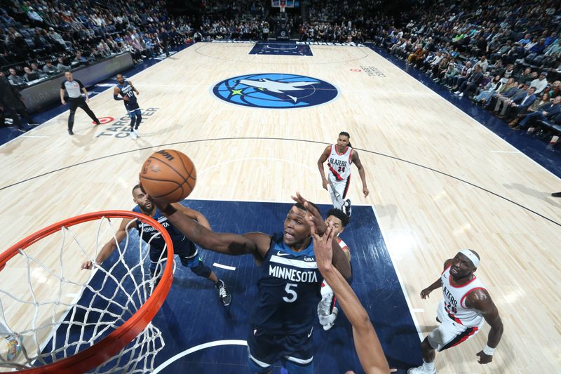 MINNEAPOLIS, MN -  MARCH 4: Anthony Edwards #5 of the Minnesota Timberwolves drives to the basket during the game against the Portland Trail Blazers on March 4, 2024 at Target Center in Minneapolis, Minnesota. NOTE TO USER: User expressly acknowledges and agrees that, by downloading and or using this Photograph, user is consenting to the terms and conditions of the Getty Images License Agreement. Mandatory Copyright Notice: Copyright 2024 NBAE (Photo by David Sherman/NBAE via Getty Images)