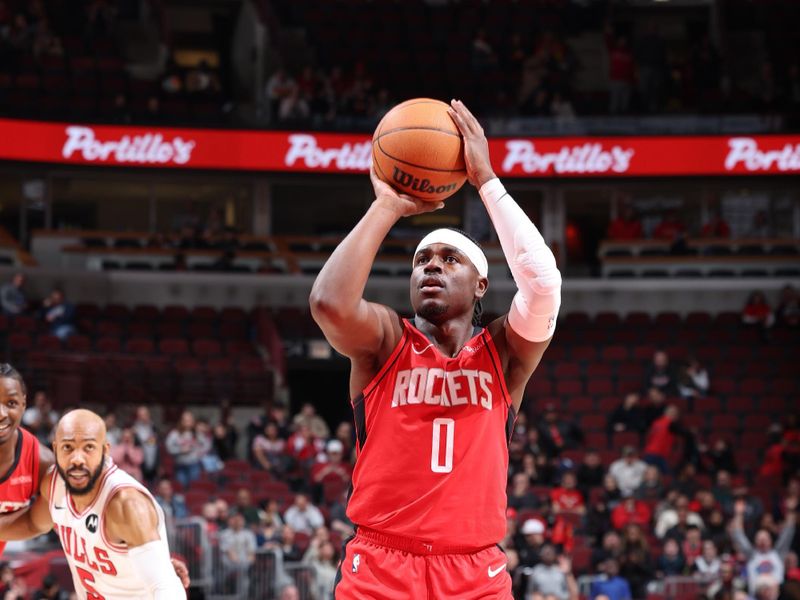 CHICAGO, IL - NOVEMBER 17:   Aaron Holiday #0 of the Houston Rockets shoots a free throw during the game against the Chicago Bulls during a regular season game on November 17, 2024 at United Center in Chicago, Illinois. NOTE TO USER: User expressly acknowledges and agrees that, by downloading and or using this photograph, User is consenting to the terms and conditions of the Getty Images License Agreement. Mandatory Copyright Notice: Copyright 2024 NBAE (Photo by Jeff Haynes/NBAE via Getty Images)