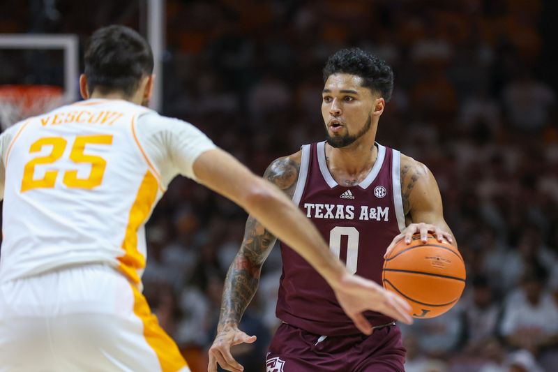 Feb 24, 2024; Knoxville, Tennessee, USA; Texas A&M Aggies guard Jace Carter (0) brings the ball up court against the Tennessee Volunteers during the first half at Thompson-Boling Arena at Food City Center. Mandatory Credit: Randy Sartin-USA TODAY Sports