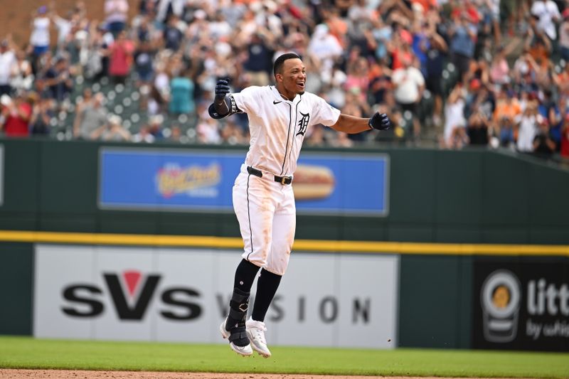 Jul 14, 2024; Detroit, Michigan, USA;  Detroit Tigers right fielder Wenceel Pérez (46) celebrates after his bunt scored the game-winning run against the Los Angeles Dodgers in the ninth inning at Comerica Park. Mandatory Credit: Lon Horwedel-USA TODAY Sports