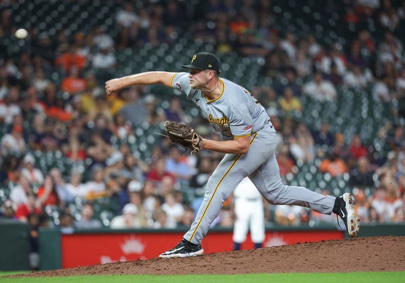 Jul 30, 2024; Houston, Texas, USA; Pittsburgh Pirates relief pitcher Hunter Stratton (63) delivers a pitch during the ninth inning against the Houston Astros at Minute Maid Park. Mandatory Credit: Troy Taormina-USA TODAY Sports