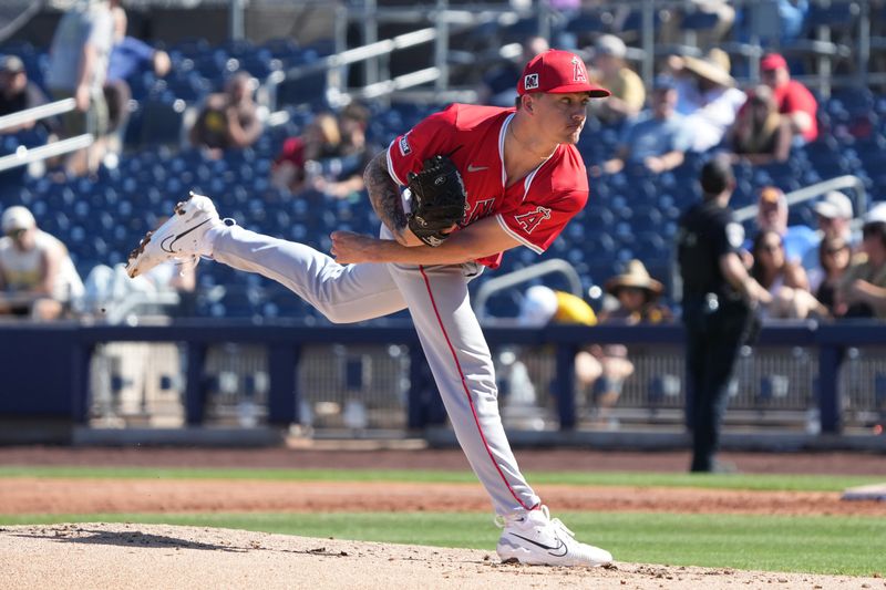 Feb 25, 2025; Peoria, Arizona, USA; San Diego Padres pitching Garrett McDaniels (57) throws against the San Diego Padres during the third inning at Peoria Sports Complex. Mandatory Credit: Rick Scuteri-Imagn Images