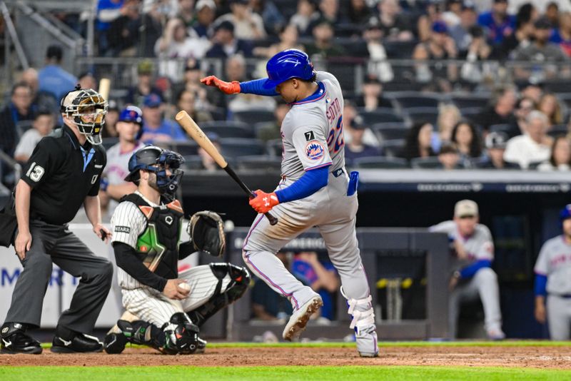 May 16, 2025; Bronx, New York, USA; New York Mets outfielder Juan Soto (22) reacts to an inside pitch by New York Yankees pitcher Carlos Rodón (not pictured) during the fifth inning at Yankee Stadium. Mandatory Credit: John Jones-Imagn Images