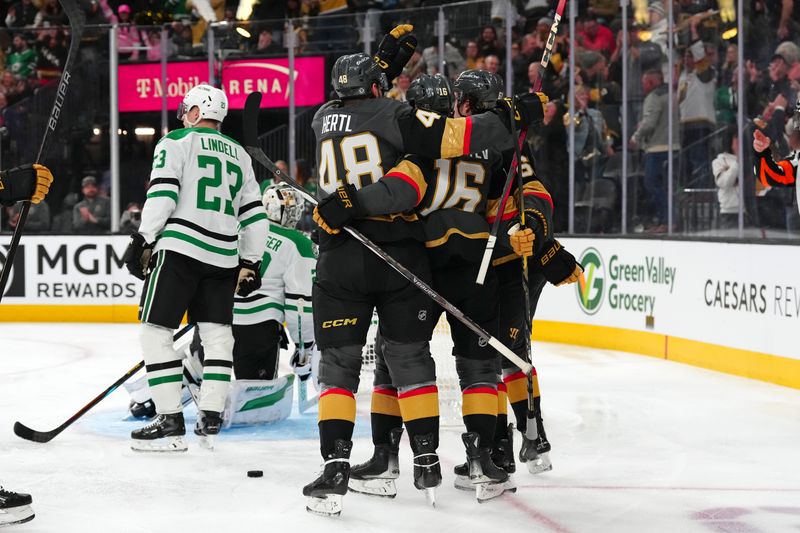 Jan 28, 2025; Las Vegas, Nevada, USA; Vegas Golden Knights left wing Pavel Dorofeyev (16) celebrates with teammates after scoring a goal against the Dallas Stars during the second period at T-Mobile Arena. Mandatory Credit: Stephen R. Sylvanie-Imagn Images