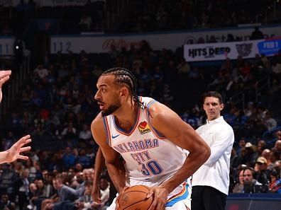 OKLAHOMA CITY, OK - DECEMBER 18:  Olivier Sarr #30 of the Oklahoma City Thunder  handles the ball during the game against the Memphis Grizzlies on December 18, 2023 at Paycom Arena in Oklahoma City, Oklahoma. NOTE TO USER: User expressly acknowledges and agrees that, by downloading and or using this photograph, User is consenting to the terms and conditions of the Getty Images License Agreement. Mandatory Copyright Notice: Copyright 2023 NBAE (Photo by Zach Beeker/NBAE via Getty Images)