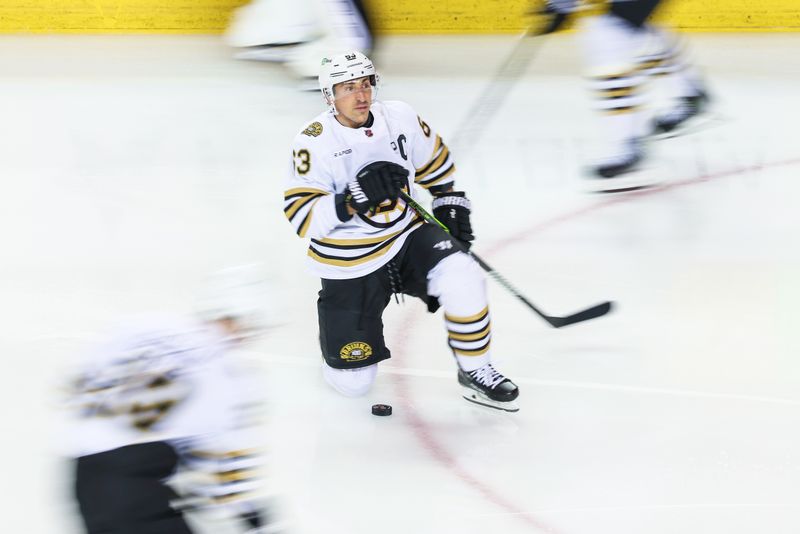 Feb 22, 2024; Calgary, Alberta, CAN; Boston Bruins left wing Brad Marchand (63) during the warmup period against the Calgary Flames at Scotiabank Saddledome. Mandatory Credit: Sergei Belski-USA TODAY Sports