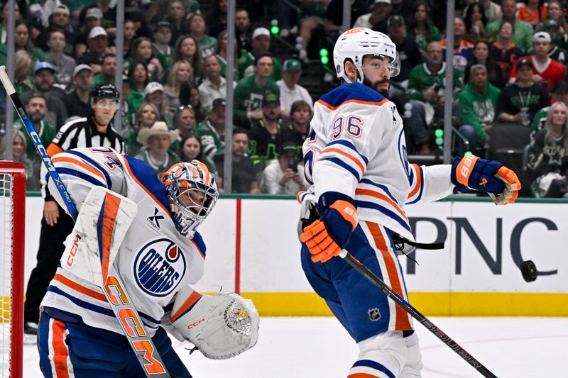 May 23, 2025; Dallas, Texas, USA; Edmonton Oilers defenseman Jake Walman (96) blocks a shot in front of goaltender Stuart Skinner (74) during the second period against the Dallas Stars in game two of the Western Conference Final of the 2025 Stanley Cup Playoffs at American Airlines Center. Mandatory Credit: Jerome Miron-Imagn Images