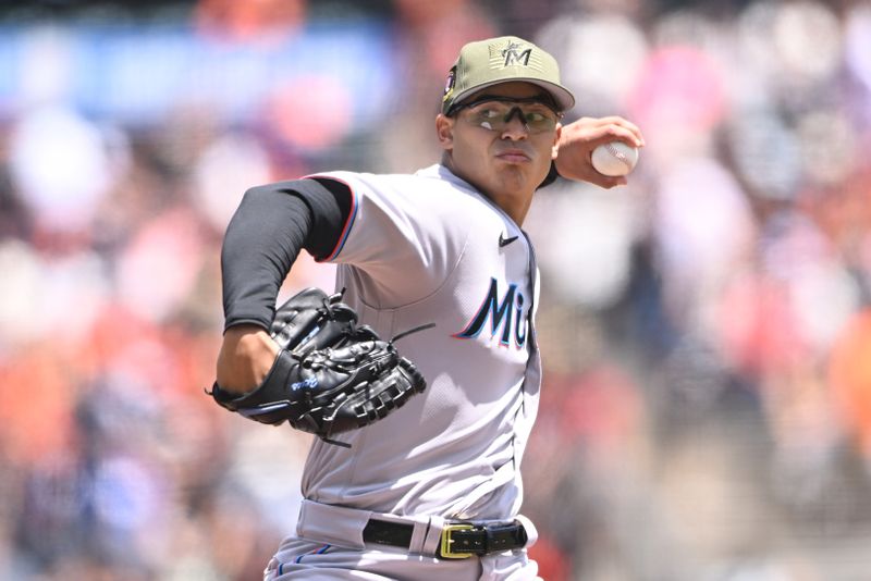 May 21, 2023; San Francisco, California, USA; Miami Marlins starting pitcher Jesus Luzardo (44) throws a pitch against the San Francisco Giants during the first inning at Oracle Park. Mandatory Credit: Robert Edwards-USA TODAY Sports