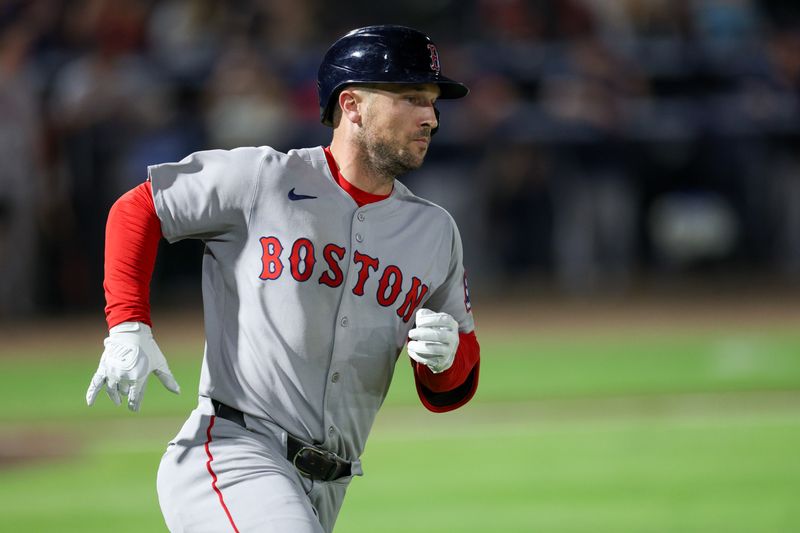 Sep 20, 2025; Tampa, Florida, USA; Boston Red Sox third baseman Alex Bregman (2) runs to first base after hitting an rbi single against the Tampa Bay Rays in the fifth inning at George M. Steinbrenner Field. Mandatory Credit: Nathan Ray Seebeck-Imagn Images