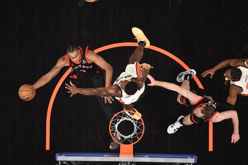 DETROIT, MI - NOVEMBER 24: Scottie Barnes #4 of the Toronto Raptors drives to the basket during the game against the Detroit Pistons on November 24, 2024 at Little Caesars Arena in Detroit, Michigan. NOTE TO USER: User expressly acknowledges and agrees that, by downloading and/or using this photograph, User is consenting to the terms and conditions of the Getty Images License Agreement. Mandatory Copyright Notice: Copyright 2024 NBAE (Photo by Chris Schwegler/NBAE via Getty Images)