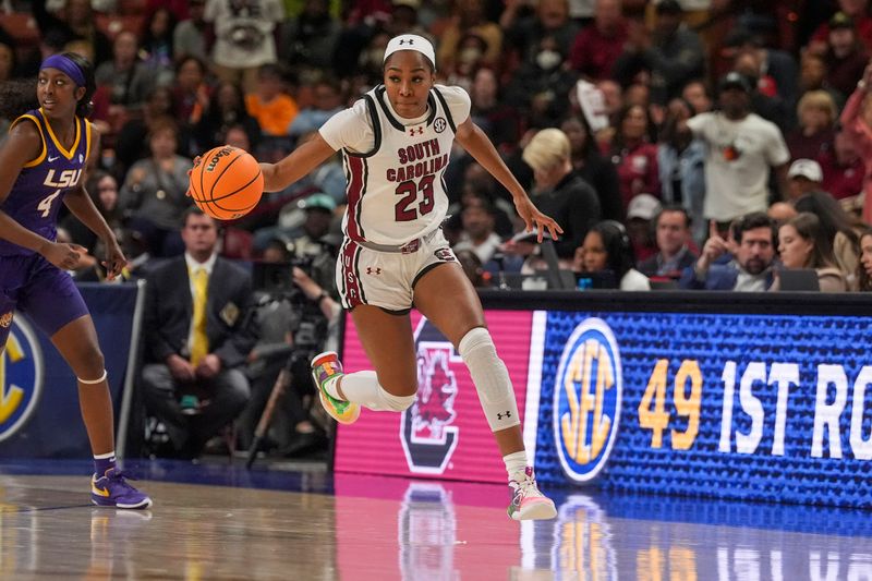 Mar 10, 2024; Greensville, SC, USA; South Carolina Gamecocks guard Bree Hall (23) dribbles the ball up court against the LSU Lady Tigers during the second half at Bon Secours Wellness Arena. Mandatory Credit: Jim Dedmon-USA TODAY Sports