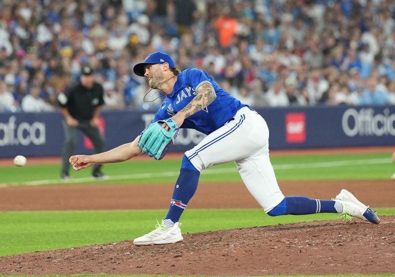 May 31, 2023; Toronto, Ontario, CAN; Toronto Blue Jays relief pitcher Adam Cimber (90) throws a pitch against the Milwaukee Brewers during the seventh inning at Rogers Centre. Mandatory Credit: Nick Turchiaro-USA TODAY Sports