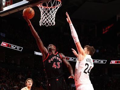 TORONTO, CANADA - DECEMBER 23:  Pascal Siakam #43 of the Toronto Raptors drives to the basket during the game against the Utah Jazz on December 23, 2023 at the Scotiabank Arena in Toronto, Ontario, Canada.  NOTE TO USER: User expressly acknowledges and agrees that, by downloading and or using this Photograph, user is consenting to the terms and conditions of the Getty Images License Agreement.  Mandatory Copyright Notice: Copyright 2023 NBAE (Photo by Vaughn Ridley/NBAE via Getty Images)