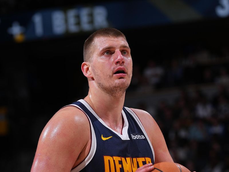 DENVER, CO - FEBRUARY 22: Nikola Jokic #15 of the Denver Nuggets prepares to shoot a free throw during the game against the Washington Wizards on February 22, 2024 at the Ball Arena in Denver, Colorado. NOTE TO USER: User expressly acknowledges and agrees that, by downloading and/or using this Photograph, user is consenting to the terms and conditions of the Getty Images License Agreement. Mandatory Copyright Notice: Copyright 2024 NBAE (Photo by Bart Young/NBAE via Getty Images)