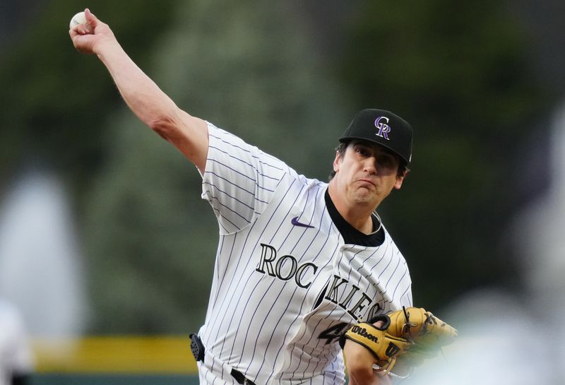 Apr 9, 2024; Denver, Colorado, USA; Colorado Rockies pitcher Cal Quantrill (47) delivers a pitch in the first inning against the Arizona Diamondbacks at Coors Field. Mandatory Credit: Ron Chenoy-USA TODAY Sports