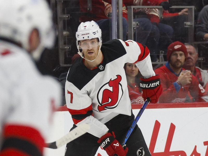 Nov 29, 2024; Detroit, Michigan, USA; New Jersey Devils defenseman Dougie Hamilton (7) handles the puck during the first period against the Detroit Red Wings at Little Caesars Arena. Mandatory Credit: Brian Bradshaw Sevald-Imagn Images